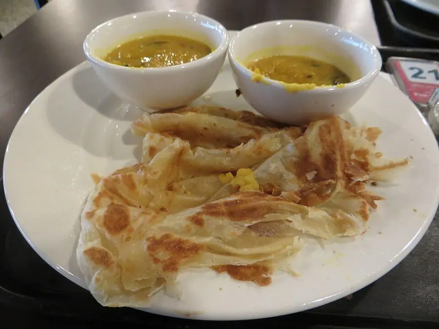 Roti Canai (Flaky flatbread with curry)